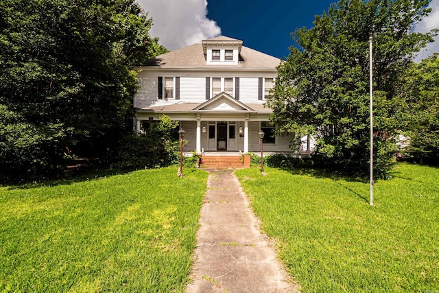 344 S Main St, Monticello, AR 71655 - traditional style home featuring a porch and a front yard