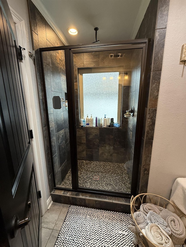 3117 Stonehenge Dr, Searcy, AR 72143 - bathroom featuring a stall shower, tile patterned floors, and recessed lighting