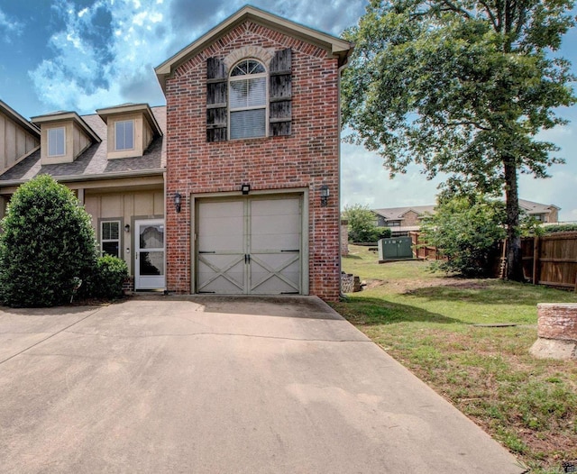 106 Venezia Ln, Maumelle, AR 72113 - view of front of home featuring driveway, brick siding, and an attached garage