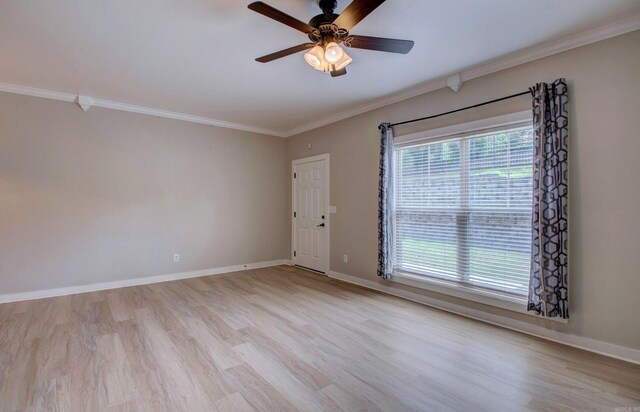 106 Venezia Ln, Maumelle, AR 72113 - empty room with ceiling fan, crown molding, wood finished floors, and baseboards