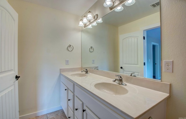 106 Venezia Ln, Maumelle, AR 72113 - full bath featuring double vanity, tile patterned floors, and baseboards