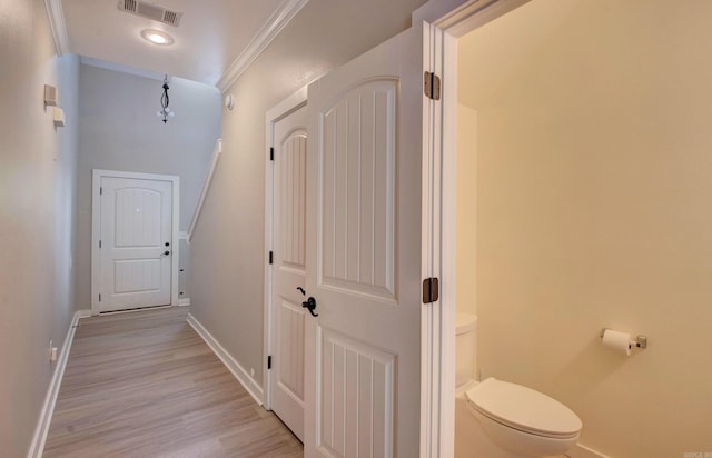 106 Venezia Ln, Maumelle, AR 72113 - hall featuring baseboards, light wood finished floors, and crown molding