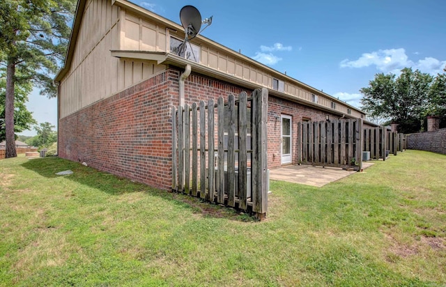 106 Venezia Ln, Maumelle, AR 72113 - rear view of property with brick siding and a patio area