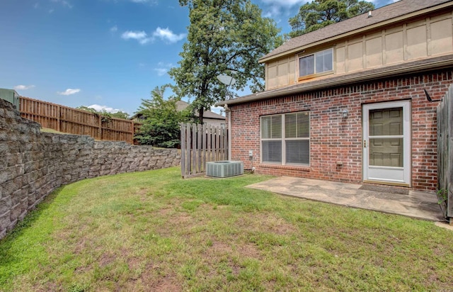 106 Venezia Ln, Maumelle, AR 72113 - view of yard featuring central air condition unit and a patio area