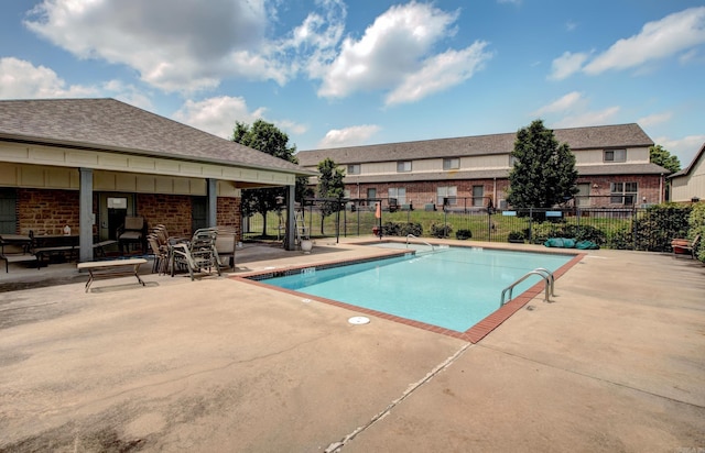 106 Venezia Ln, Maumelle, AR 72113 - community pool featuring a patio area and fence
