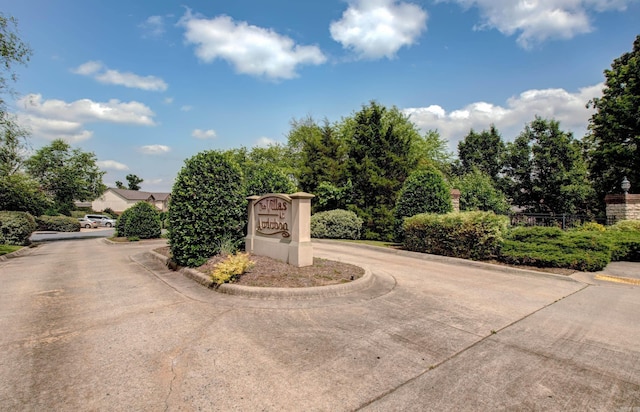 106 Venezia Ln, Maumelle, AR 72113 - view of concrete road featuring curbs