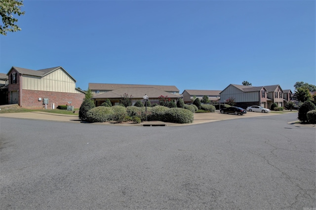106 Venezia Ln, Maumelle, AR 72113 - view of asphalt street featuring a residential view