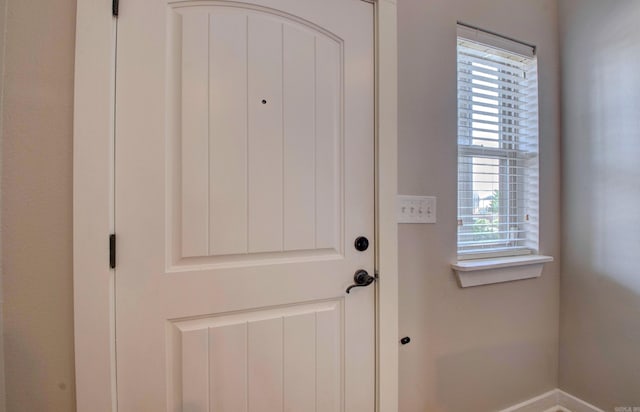 106 Venezia Ln, Maumelle, AR 72113 - doorway to outside featuring baseboards