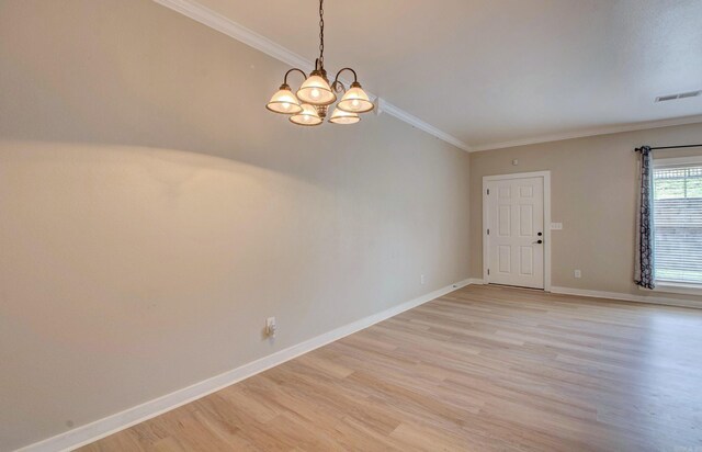 106 Venezia Ln, Maumelle, AR 72113 - spare room with light wood-style flooring, a chandelier, ornamental molding, and baseboards