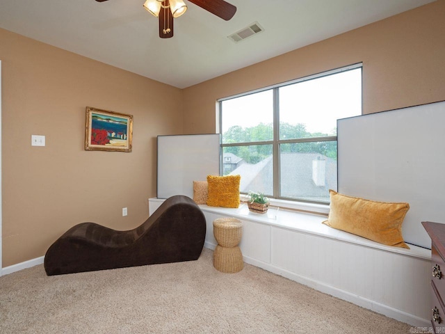 14 Woodridge Dr, Little Rock, AR 72204 - living area with ceiling fan and carpet flooring