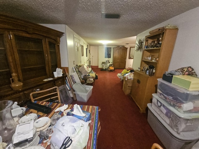 11806 Veronica, North Little Rock, AR 72118 - miscellaneous room featuring a textured ceiling and carpet floors
