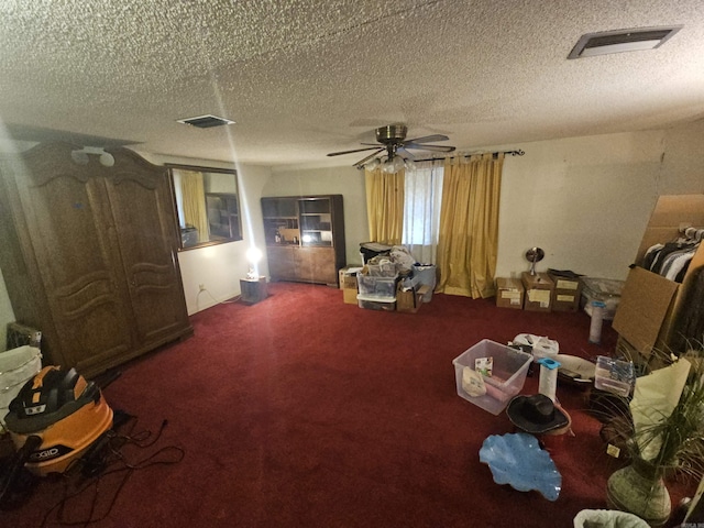 11806 Veronica, North Little Rock, AR 72118 - living room featuring a textured ceiling, carpet flooring, and ceiling fan