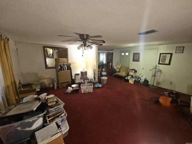 11806 Veronica, North Little Rock, AR 72118 - miscellaneous room with a textured ceiling, a ceiling fan, and carpet floors