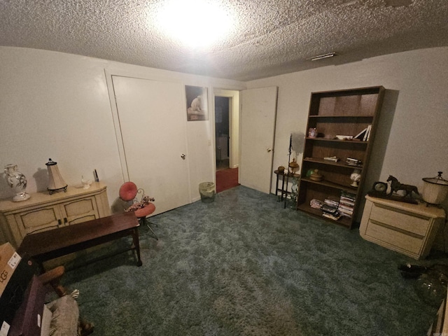 11806 Veronica, North Little Rock, AR 72118 - sitting room featuring carpet flooring and a textured ceiling