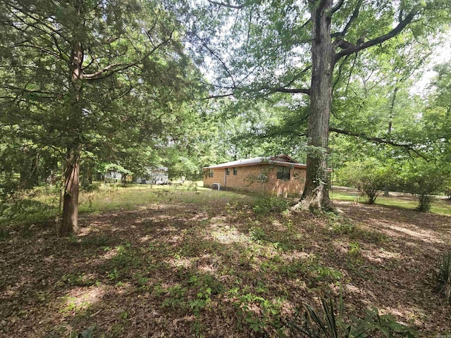 11806 Veronica, North Little Rock, AR 72118 - view of yard with a view of trees
