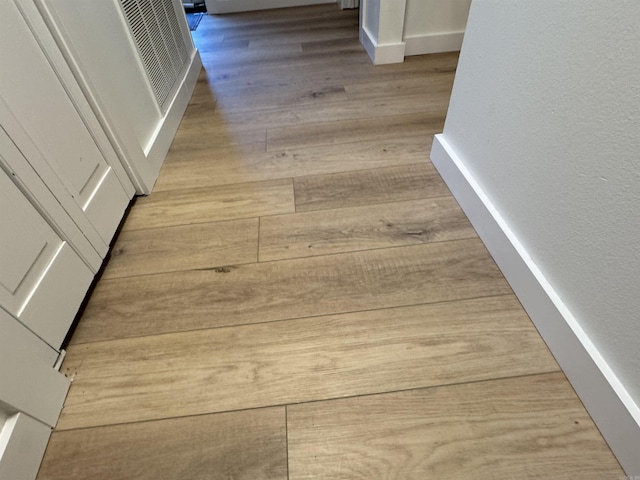 7306 Dakota Dr, North Little Rock, AR 72116 - detailed view of wood finished floors and baseboards