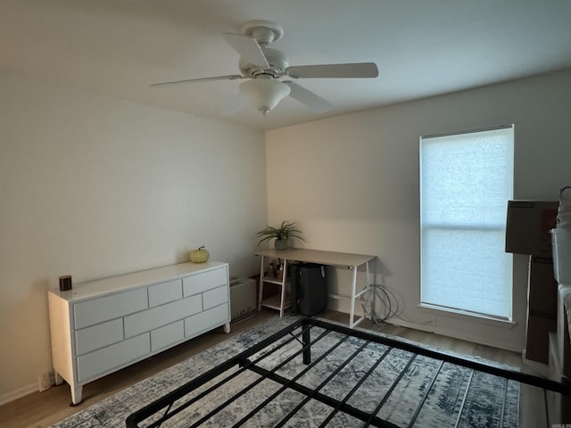 7306 Dakota Dr, North Little Rock, AR 72116 - unfurnished bedroom with wood finished floors and ceiling fan