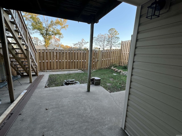 7306 Dakota Dr, North Little Rock, AR 72116 - view of patio featuring stairs and fence