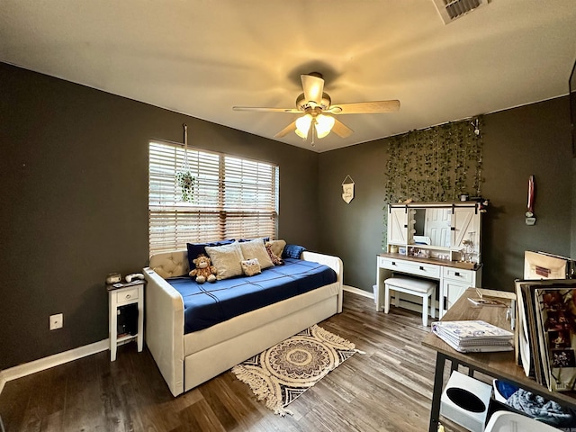 1041 Slatecreek Way, Lonsdale, AR 72087 - bedroom with baseboards, wood finished floors, and ceiling fan