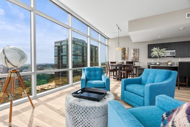 300 E Third # 1302, Little Rock, AR 72201 - living area featuring a wall of windows