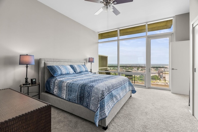 300 E Third # 1302, Little Rock, AR 72201 - carpeted bedroom with a wall of windows, access to exterior, and ceiling fan