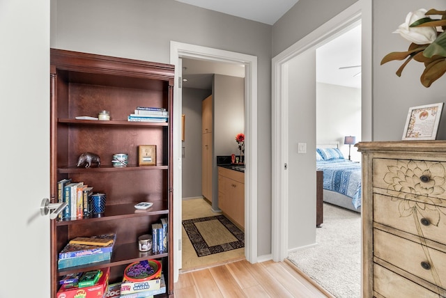 300 E Third # 1302, Little Rock, AR 72201 - hall featuring light wood finished floors and baseboards
