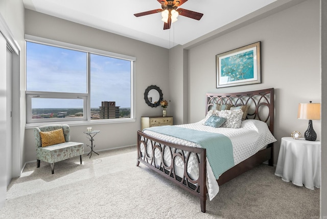 300 E Third # 1302, Little Rock, AR 72201 - bedroom with carpet flooring, ceiling fan, and baseboards