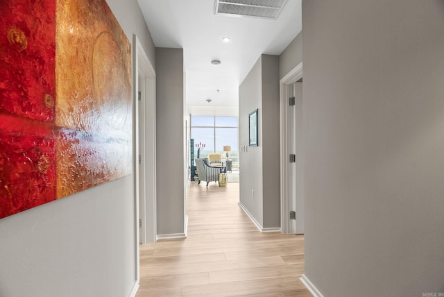 300 E Third # 1302, Little Rock, AR 72201 - hall with light wood-type flooring and baseboards
