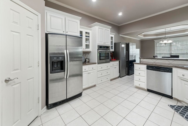 223 Maranes Cir, Maumelle, AR 72113 - kitchen featuring appliances with stainless steel finishes, white cabinets, a chandelier, ornamental molding, and glass insert cabinets