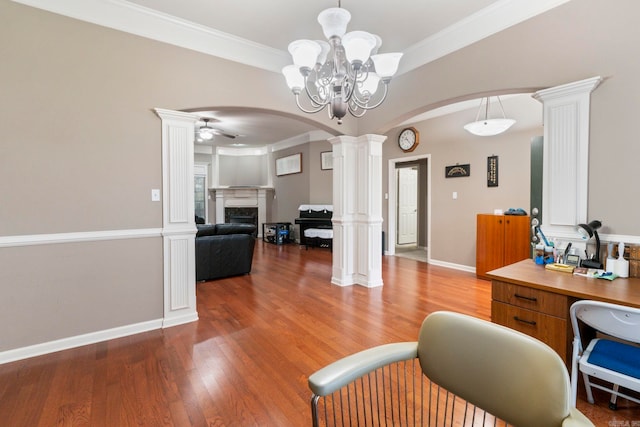 223 Maranes Cir, Maumelle, AR 72113 - office space featuring ornate columns, arched walkways, light wood-type flooring, a chandelier, and ceiling fan