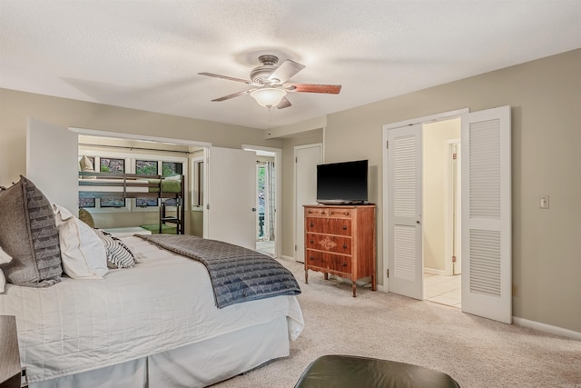 451 Forrest Dr, Heber Springs, AR 72543 - bedroom with light colored carpet, a ceiling fan, baseboards, and a textured ceiling