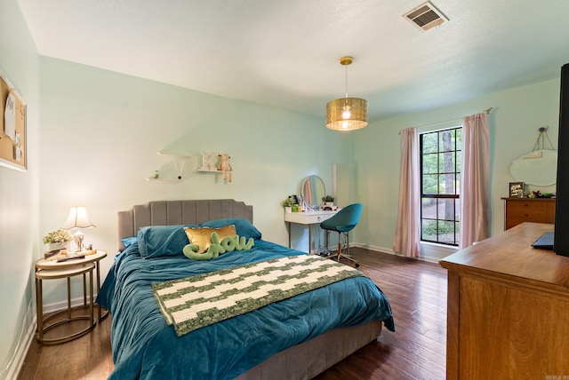 5623 Ridgeway Dr, Benton, AR 72019 - bedroom with wood finished floors and baseboards