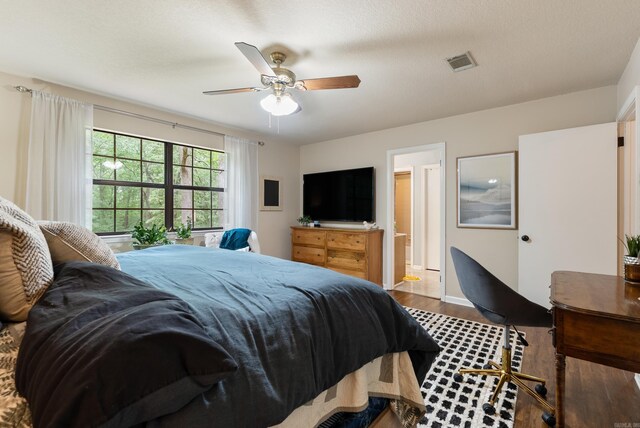 5623 Ridgeway Dr, Benton, AR 72019 - bedroom featuring wood finished floors and ceiling fan