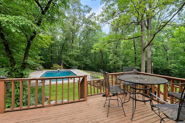 5623 Ridgeway Dr, Benton, AR 72019 - wooden terrace with an outdoor pool and outdoor dining area