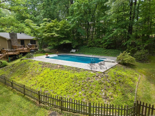 5623 Ridgeway Dr, Benton, AR 72019 - swimming pool featuring a wooden deck, a patio area, and a diving board