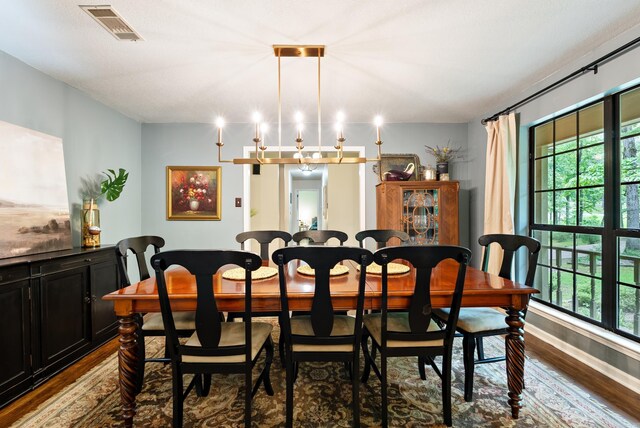 5623 Ridgeway Dr, Benton, AR 72019 - dining room featuring dark wood-type flooring and baseboards
