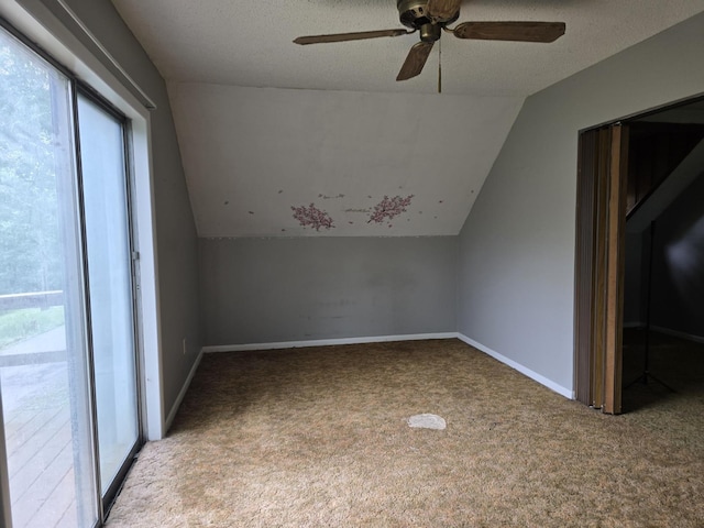 171 Riverbend Rd, Mammoth Spring, AR 72554 - bonus room featuring lofted ceiling, carpet, ceiling fan, baseboards, and a textured ceiling