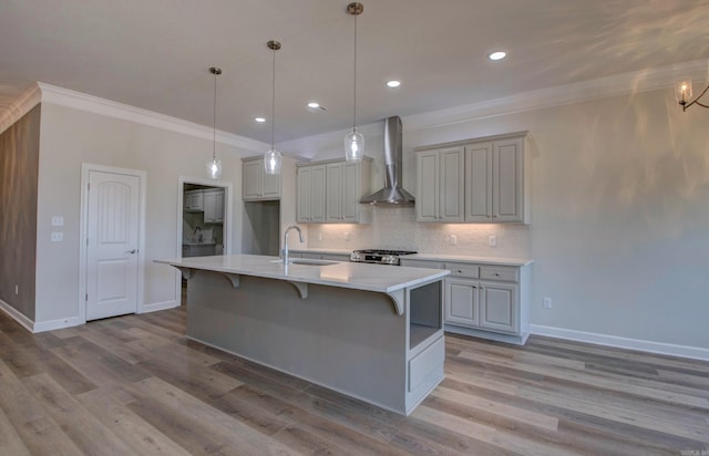 121 Majestic Cir, Maumelle, AR 72113 - kitchen with wall chimney range hood, a sink, range, ornamental molding, and a kitchen breakfast bar