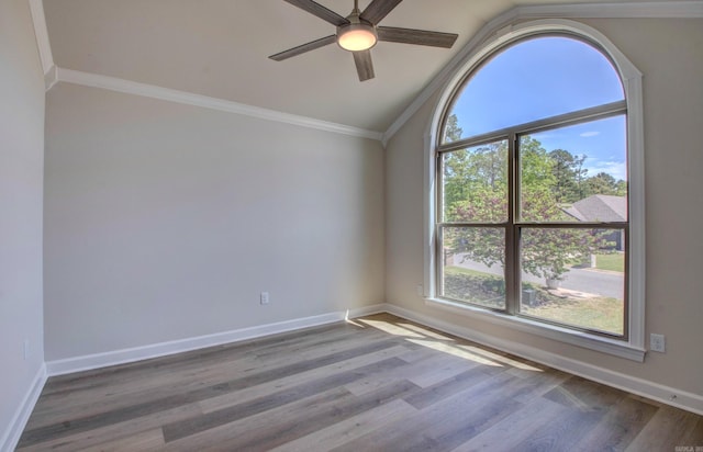 121 Majestic Cir, Maumelle, AR 72113 - unfurnished room featuring lofted ceiling, a ceiling fan, wood finished floors, baseboards, and ornamental molding