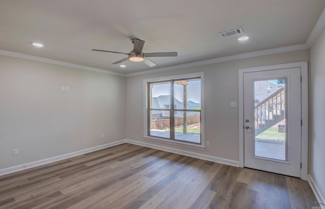 121 Majestic Cir, Maumelle, AR 72113 - empty room featuring wood finished floors, baseboards, ceiling fan, ornamental molding, and recessed lighting