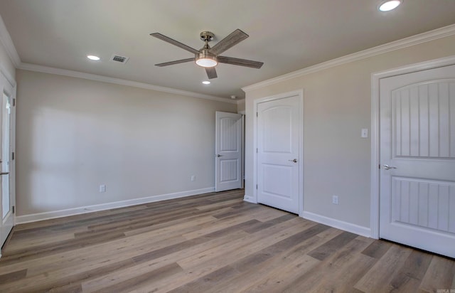 121 Majestic Cir, Maumelle, AR 72113 - unfurnished bedroom featuring wood finished floors, recessed lighting, ornamental molding, baseboards, and ceiling fan