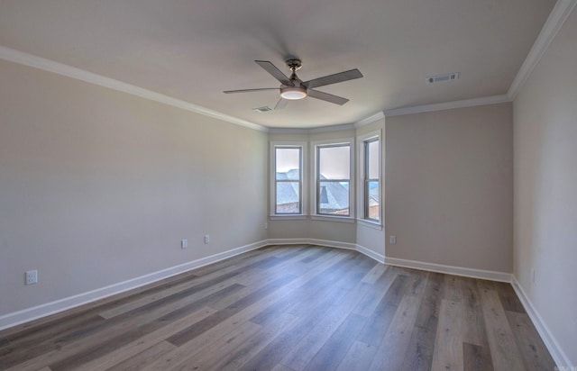 121 Majestic Cir, Maumelle, AR 72113 - empty room featuring wood finished floors, a ceiling fan, baseboards, and crown molding