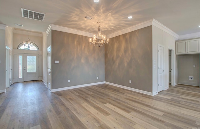 121 Majestic Cir, Maumelle, AR 72113 - foyer featuring a chandelier, crown molding, light wood-type flooring, baseboards, and recessed lighting