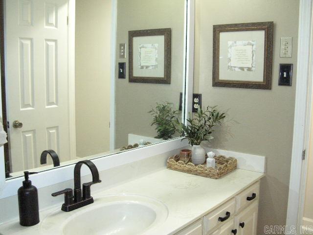 11 Sharondale Ct, Maumelle, AR 72113 - bathroom with vanity