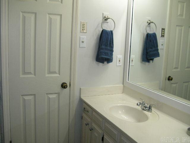 11 Sharondale Ct, Maumelle, AR 72113 - bathroom with vanity