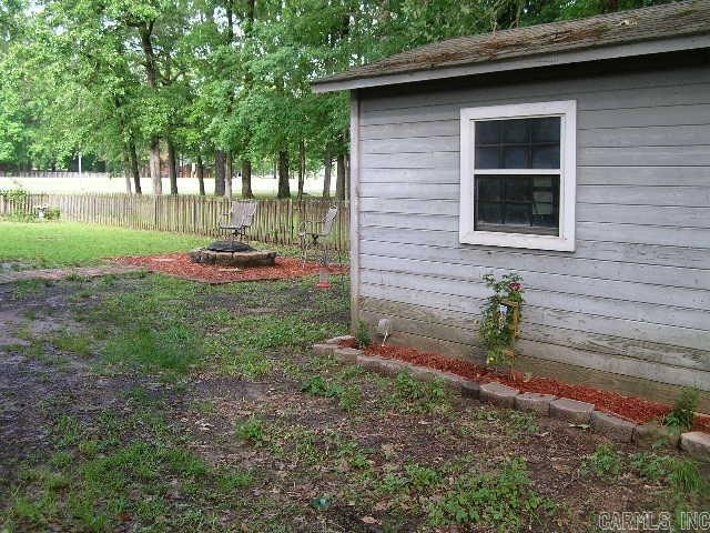 11 Sharondale Ct, Maumelle, AR 72113 - view of yard featuring fence