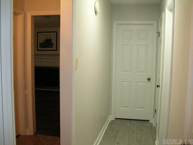 11 Sharondale Ct, Maumelle, AR 72113 - corridor with baseboards