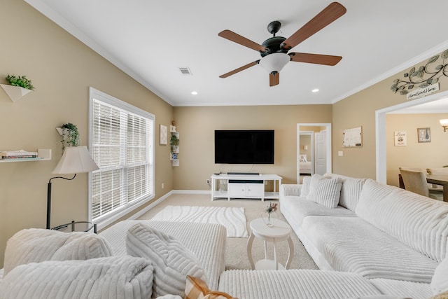 41 Winners Cir, Cabot, AR 72023 - living room with crown molding, baseboards, recessed lighting, light colored carpet, and a ceiling fan