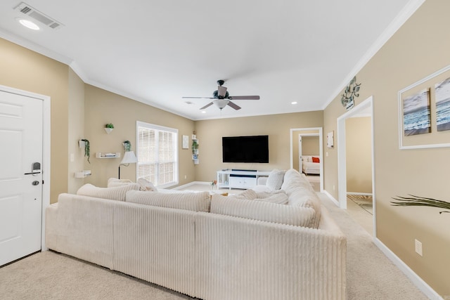 41 Winners Cir, Cabot, AR 72023 - living area featuring crown molding, a ceiling fan, light colored carpet, and baseboards