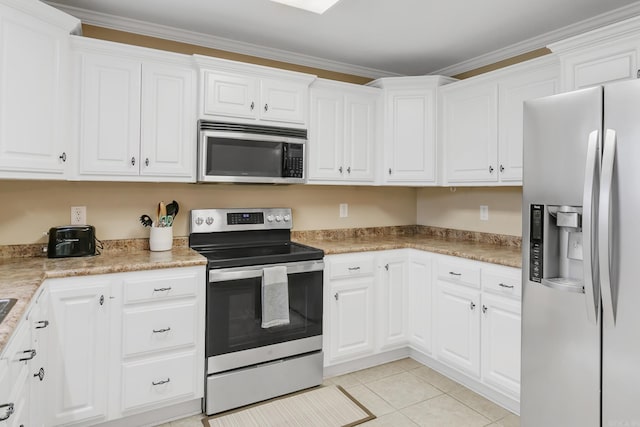 41 Winners Cir, Cabot, AR 72023 - kitchen featuring appliances with stainless steel finishes, white cabinetry, light tile patterned flooring, crown molding, and light countertops